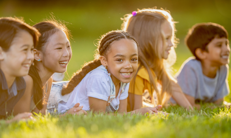 kids plaing in grass with poison?